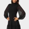 bebe2152_black_2_42bb2224-467b-42ce-98f9-7b6384445971 Long Sleeve Mock Neck Chifon Smocked Mini Dress